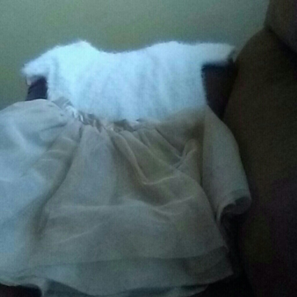 White shirt and gold skirt